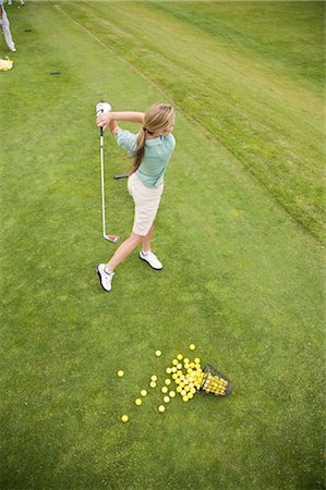 simsearch:600-02637652,k - Woman Playing Golf, Burlington, Ontario, Canada Stock Photo - Premium Royalty-Free, Code: 600-02701164