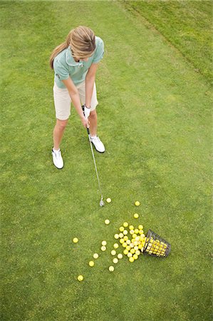 Woman Playing Golf, Burlington, Ontario, Canada Fotografie stock - Premium Royalty-Free, Codice: 600-02701163