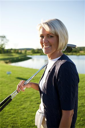 Woman Playing Golf, Burlington, Ontario, Canada Stock Photo - Premium Royalty-Free, Code: 600-02701185