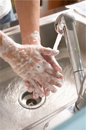 disinfect - Man Washing his Hands Stock Photo - Premium Royalty-Free, Code: 600-02702516