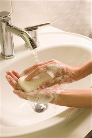 disinfect - Woman Washing her Hands Stock Photo - Premium Royalty-Free, Code: 600-02702512