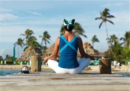 Woman Doing Yoga on Dock Stock Photo - Premium Royalty-Free, Code: 600-02702704