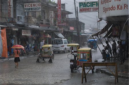 rainy street scene - Catbalogan, Samar Province, Philippines Stock Photo - Premium Royalty-Free, Code: 600-02723090