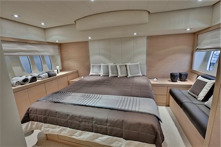 elegant interior furniture sofa - Overview of Master Bedroom Aboard Abacus 52 Motorboat Stock Photo - Premium Royalty-Free, Code: 600-02738164