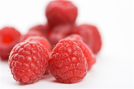 rasberries on white background - Raspberries Stock Photo - Premium Royalty-Free, Code: 600-02738503