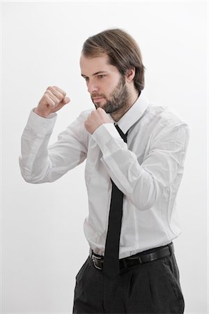 defensive - Businessman Fighting Stock Photo - Premium Royalty-Free, Code: 600-02756614