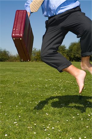 Businessman Clicking His Heels Foto de stock - Sin royalties Premium, Código: 600-02757017