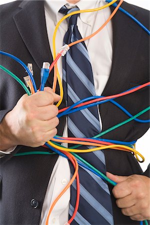 red de ordenadores - Close-up of Businessman Holding CAT5 Cables Foto de stock - Sin royalties Premium, Código: 600-02757039