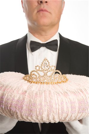 pampered princess - Butler Holding a Tiara on a Cushion Stock Photo - Premium Royalty-Free, Code: 600-02757080