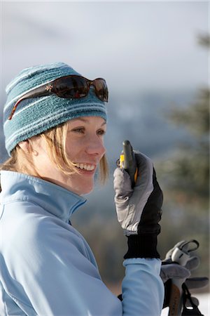 racchetta da sci - Close-up of Woman on Skis, using Walkie Talkie, Whistler, British Columbia, Canada Fotografie stock - Premium Royalty-Free, Codice: 600-02757296