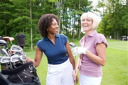 fun with black friends - Women Golfing Stock Photo - Premium Royalty-Free, Code: 600-02751456