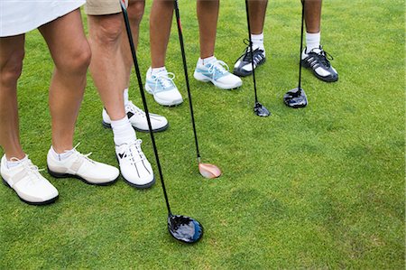 Close-up of Golfers' Feet Stock Photo - Premium Royalty-Free, Code: 600-02751522