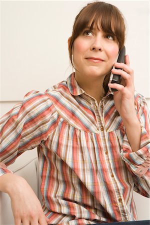 simsearch:600-02786747,k - Woman Using Cellphone Stock Photo - Premium Royalty-Free, Code: 600-02786745