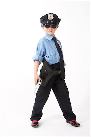 edward pond - Jeune fille habillée en agent de Police Photographie de stock - Premium Libres de Droits, Code: 600-02786824