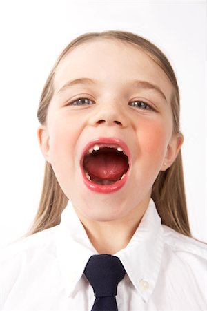 private school - Close-up of Girl with Missing Teeth Foto de stock - Sin royalties Premium, Código: 600-02786882