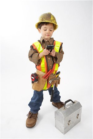 simsearch:700-05837598,k - Boy Dressed Up as Construction Worker Foto de stock - Sin royalties Premium, Código: 600-02828534