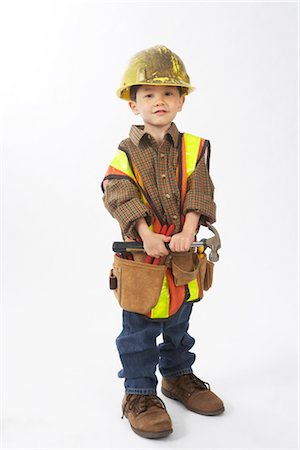 Boy Dressed Up as Construction Worker Stock Photo - Premium Royalty-Free, Code: 600-02828533