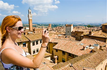 Woman Taking Photograph, Siena, Siena Province, Tuscany, Italy Stock Photo - Premium Royalty-Free, Code: 600-02828596