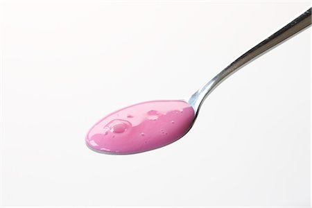 pink syrup - Spoonful of Medicine Stock Photo - Premium Royalty-Free, Code: 600-02833486