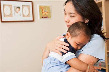 simsearch:700-00917549,k - Mother Holding Baby Boy Stock Photo - Premium Royalty-Free, Code: 600-02833796