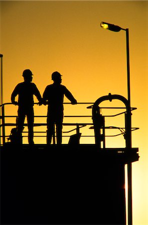 Mining, Ore Processing Plant, Sunset Silhouette, Workers Foto de stock - Sin royalties Premium, Código: 600-02886050