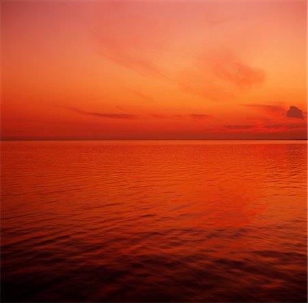 red orange sunset - Seascape at Sunset Stock Photo - Premium Royalty-Free, Code: 600-02886447