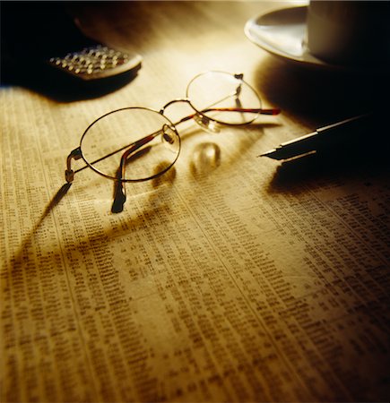 financial forecast - Finance Still Life, Spectacles on Stock Listings Stock Photo - Premium Royalty-Free, Code: 600-02886550