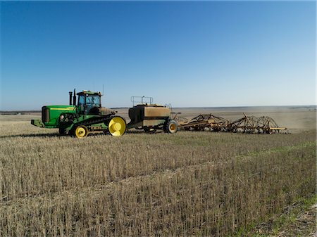 farmer tractor - Wheat Sowing, Tractor Pulling Seed Drill, Australia Stock Photo - Premium Royalty-Free, Code: 600-02886652