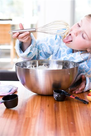 pancake breakfast - Little Girl Baking, Eating the Batter Stock Photo - Premium Royalty-Free, Code: 600-02883069