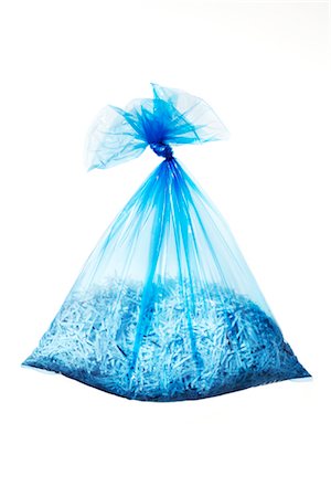 Blue Recycling Bag Full of Shredded Paper Stock Photo - Premium Royalty-Free, Code: 600-02883253