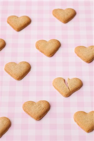 sweet heart shape - Heart-shaped Cookies, One Broken Stock Photo - Premium Royalty-Free, Code: 600-02903813