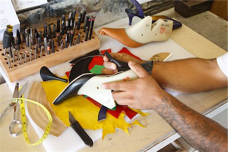 Close-up of Man Making a Shoe, Maida's Black Jack Boot Company, Houston, Texas, USA Stock Photo - Premium Royalty-Free, Code: 600-02912095