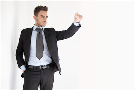 simsearch:700-03621278,k - Businessman Pointing Stock Photo - Premium Royalty-Free, Code: 600-02912358