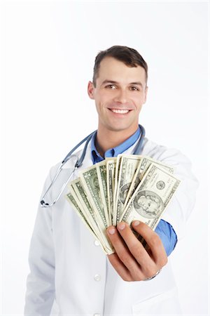 exclusive business - Doctor Holding Cash Stock Photo - Premium Royalty-Free, Code: 600-02912793