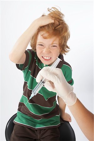 funny wellness healthcare - Anxious Boy About to Get a Needle Stock Photo - Premium Royalty-Free, Code: 600-02912815