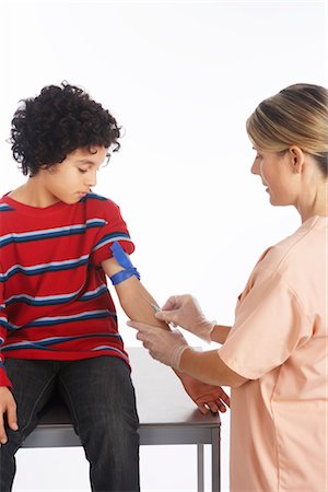 Boy Getting a Needle Stock Photo - Premium Royalty-Free, Code: 600-02912825