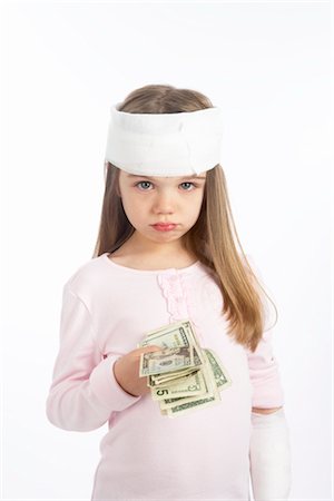 financement - Girl With a Bandage on Her Head Holding Cash Foto de stock - Sin royalties Premium, Código: 600-02912837