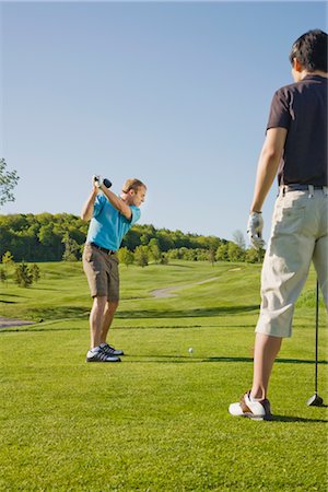 Men Playing Golf Stock Photo - Premium Royalty-Free, Code: 600-02935450