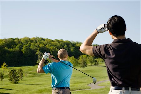 Men Playing Golf Foto de stock - Sin royalties Premium, Código: 600-02935451