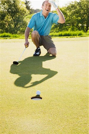 simsearch:640-01356786,k - Man Playing Golf Foto de stock - Sin royalties Premium, Código: 600-02935487