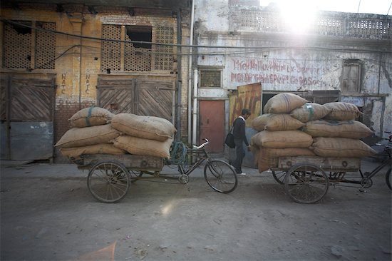 Sacks Stacked on Carts, Amritsar, Punjab, India Stock Photo - Premium Royalty-Free, Artist: Sarah Murray, Image code: 600-02957875