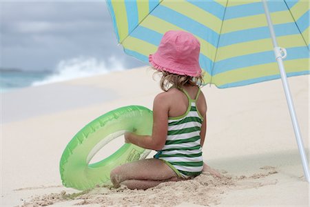 person with beach hat back - Little Girl Playing on the Beach, Paradise Island, Bahamas Stock Photo - Premium Royalty-Free, Code: 600-02967520