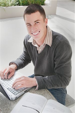 University Student Using Laptop Computer Stock Photo - Premium Royalty-Free, Code: 600-02973194