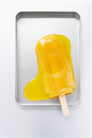 eis am stiel - Schmelzen von Eis am Stiel Stockbilder - Premium RF Lizenzfrei, Bildnummer: 600-03003545