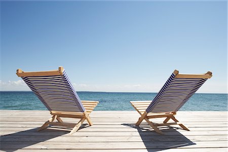 Paire de chaises longues sur le pont Photographie de stock - Premium Libres de Droits, Code: 600-03017270