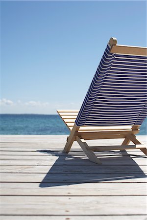 Deck Chair on Deck Foto de stock - Sin royalties Premium, Código: 600-03017271