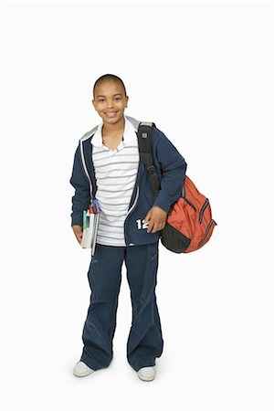 Boy with School Bag and Books Stock Photo - Premium Royalty-Free, Code: 600-03017572