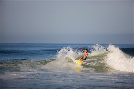 Surfer at Dusk, Punta Burros, Nayarit, Mexico Stock Photo - Premium Royalty-Free, Code: 600-03017890