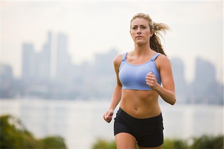 Woman Running in Park, Seattle, Washington, USA Foto de stock - Sin royalties Premium, Código: 600-03017922