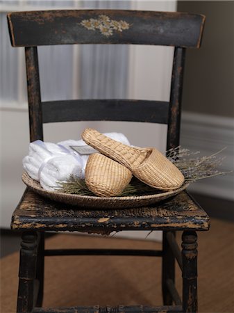 Still Life of Straw Slippers with Lavender and Towels on Chair Stock Photo - Premium Royalty-Free, Code: 600-03018076